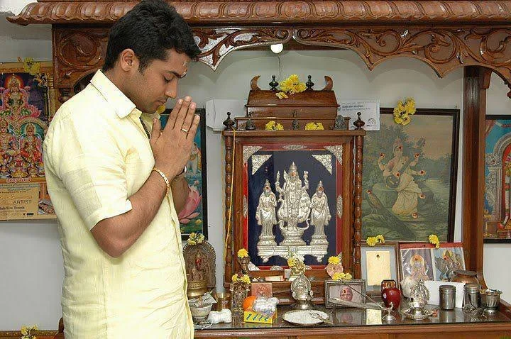 surya at prayers.webp