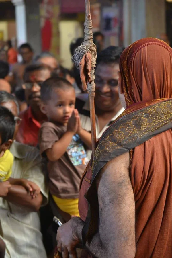 Bala Periyava with cute boy.webp